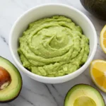 2-Ingredient Guacamole Recipe: A close-up of fresh ingredients that create the guacamoli.