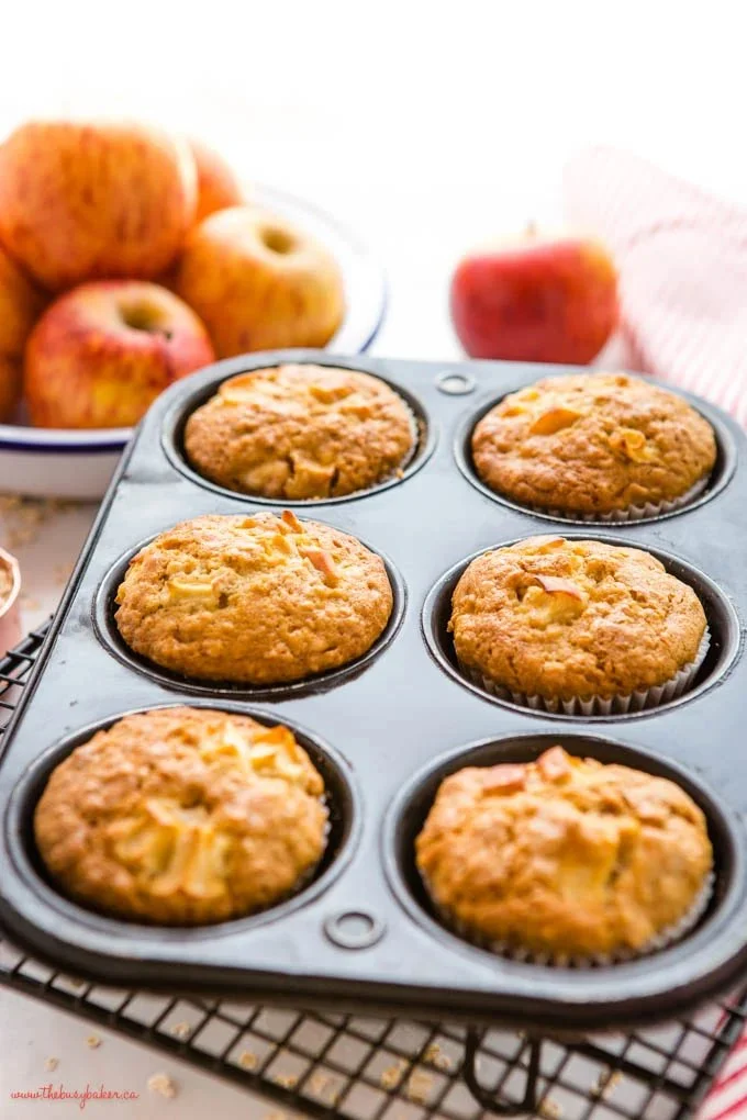 Freshly baked Apple Oat Muffins with cinnamon and apple chunks
