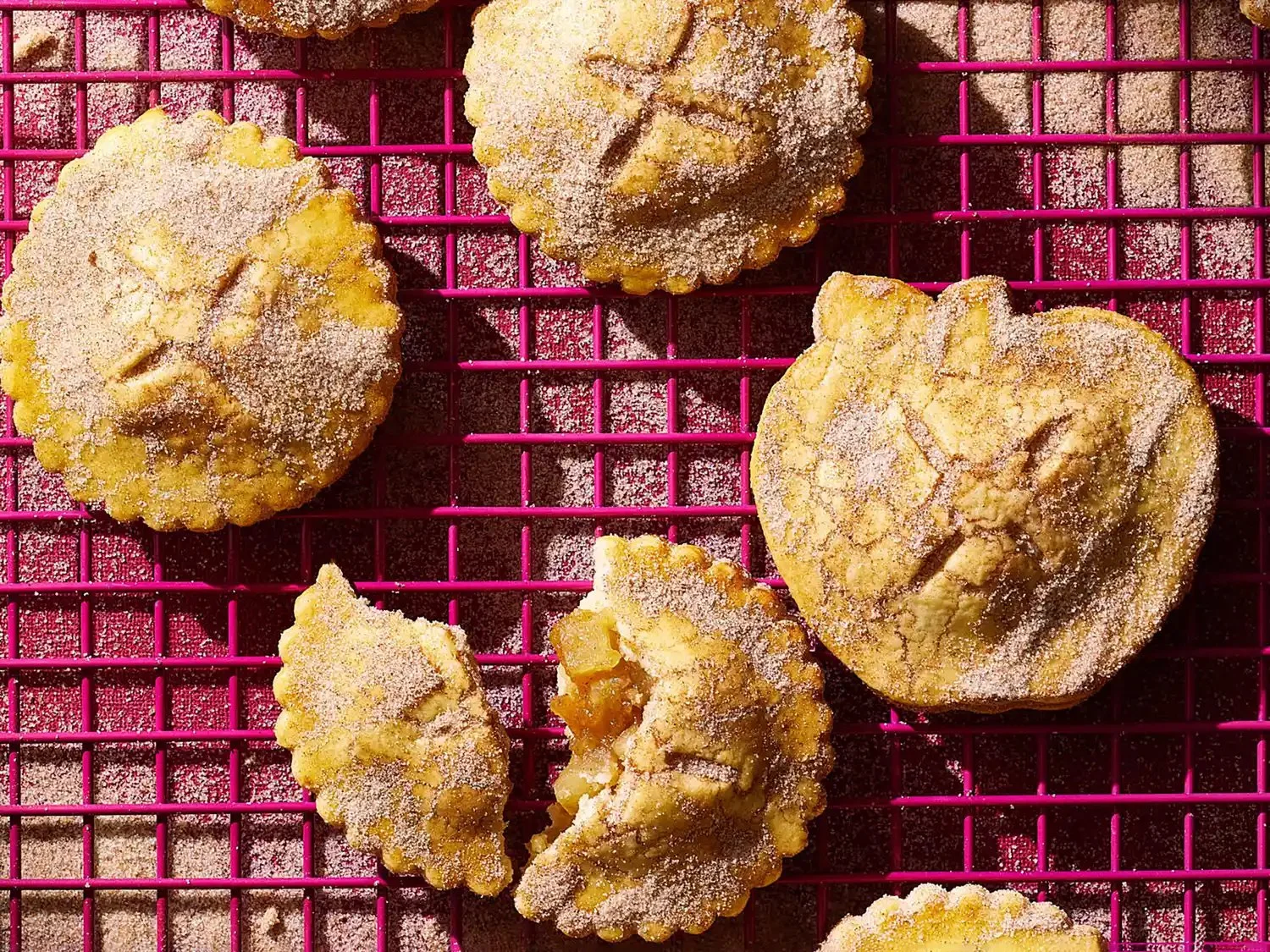 Delicious apple pie cookies on a plate, showcasing their golden brown color.