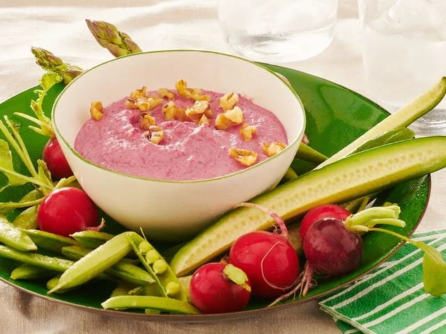 Delicious Beet Walnut Goat Cheese Dip served in a bowl with fresh ingredients