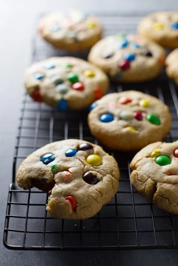 Big Soft M&M Cookies with colorful chocolate candies on a plate