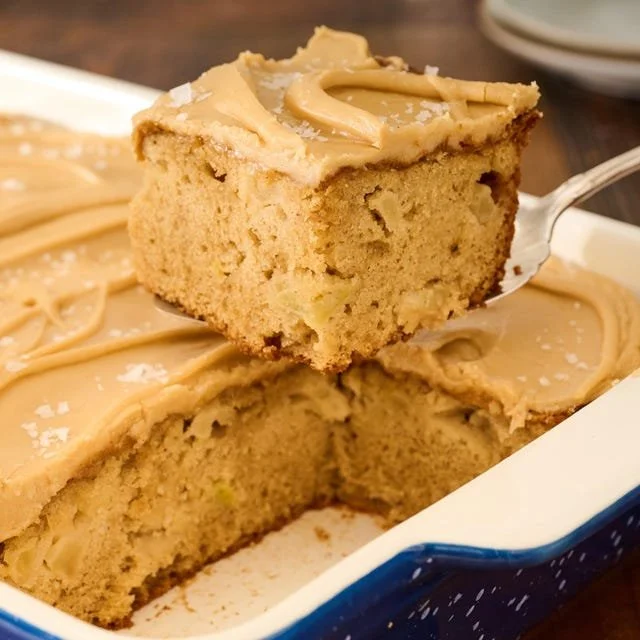 Delicious Caramel Apple Sheet Cake with drizzled caramel and apple slices.