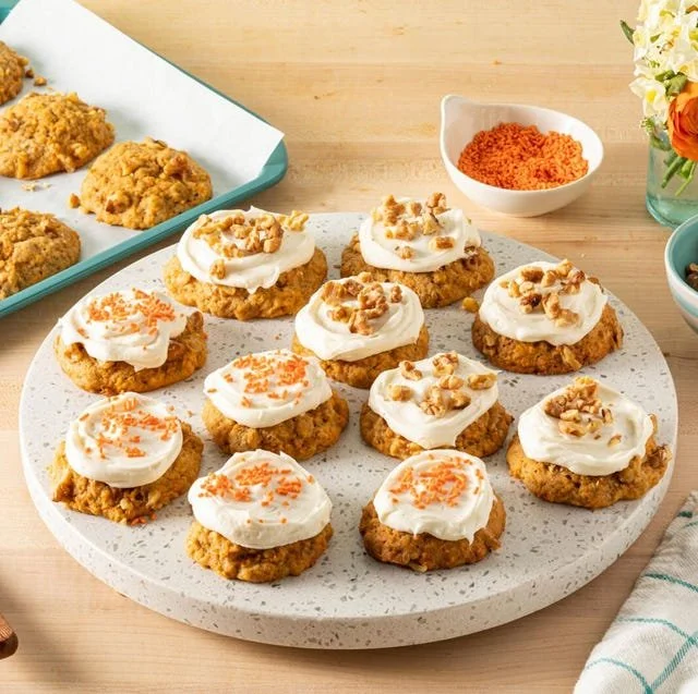 Delicious carrot cake cookies with cream cheese frosting on a plate