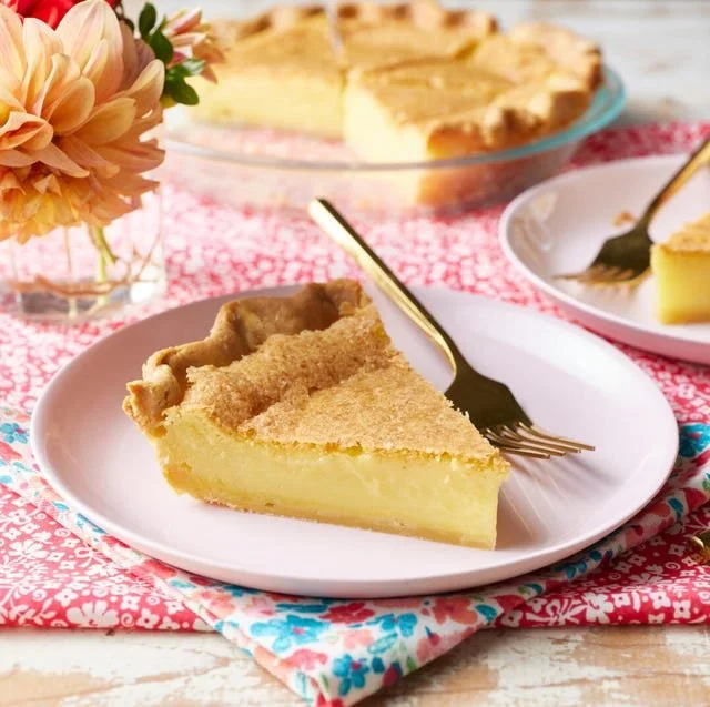 Delicious slice of homemade chess pie with a flaky crust and rich filling.