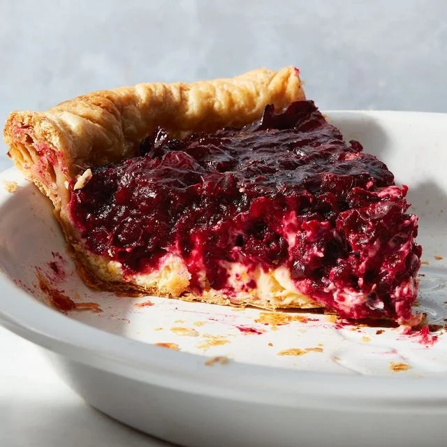 Homemade Cranberry-Orange Pie with a golden crust and vibrant filling.