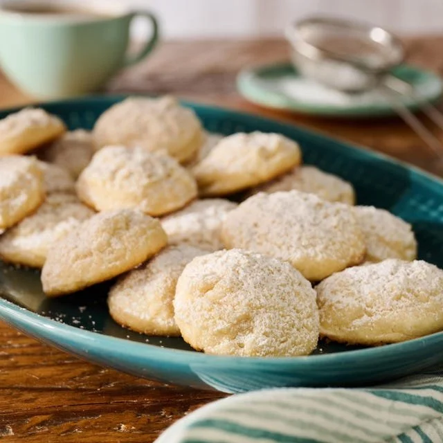 Delicious cream cheese cookies on a cooling rack