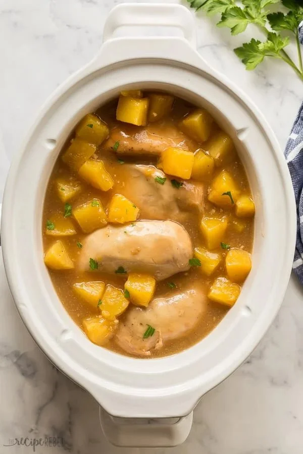 Crockpot Pineapple Chicken garnished and plated for serving