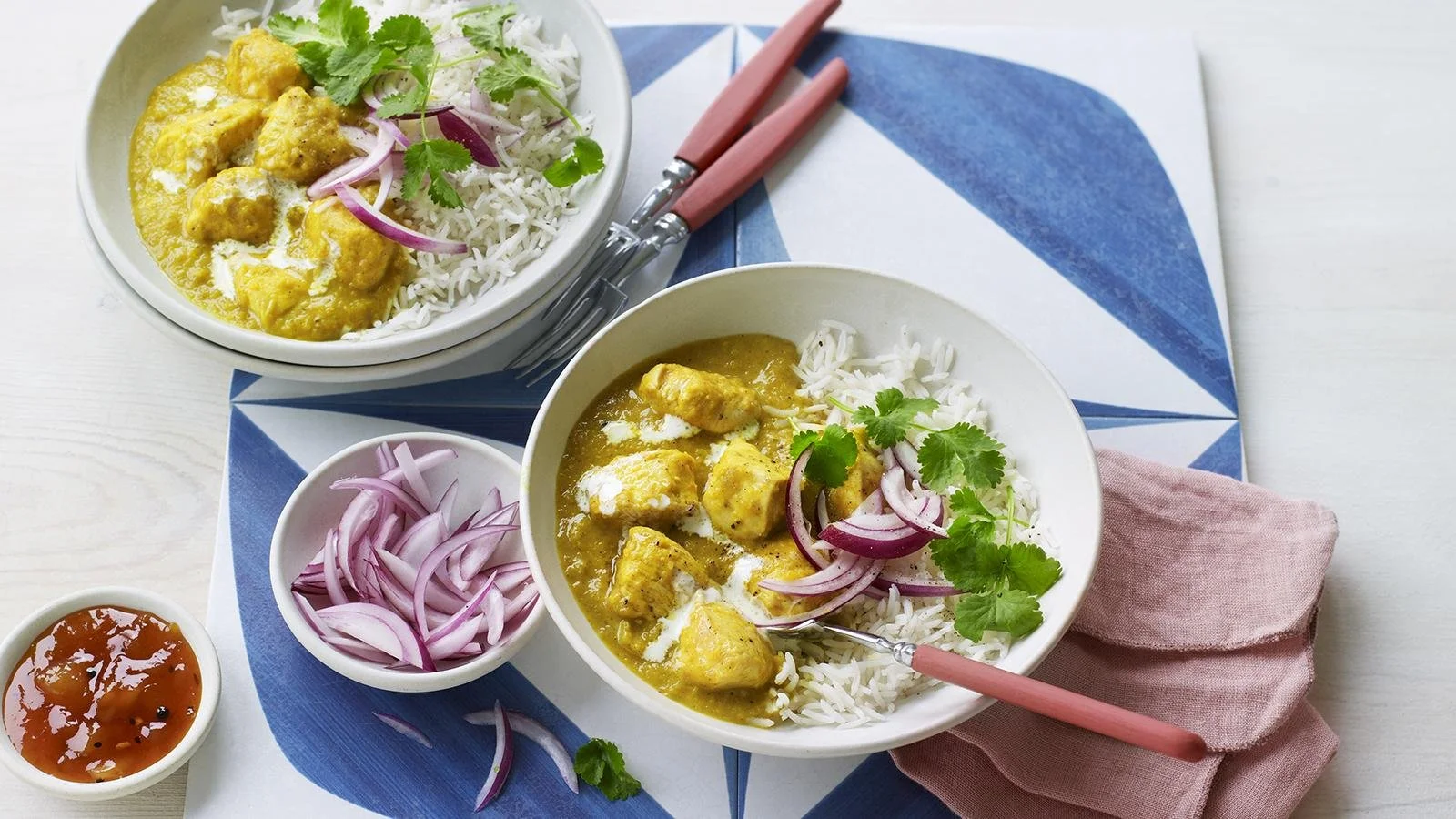 Bowl of Easy Chicken Korma with creamy sauce and spices