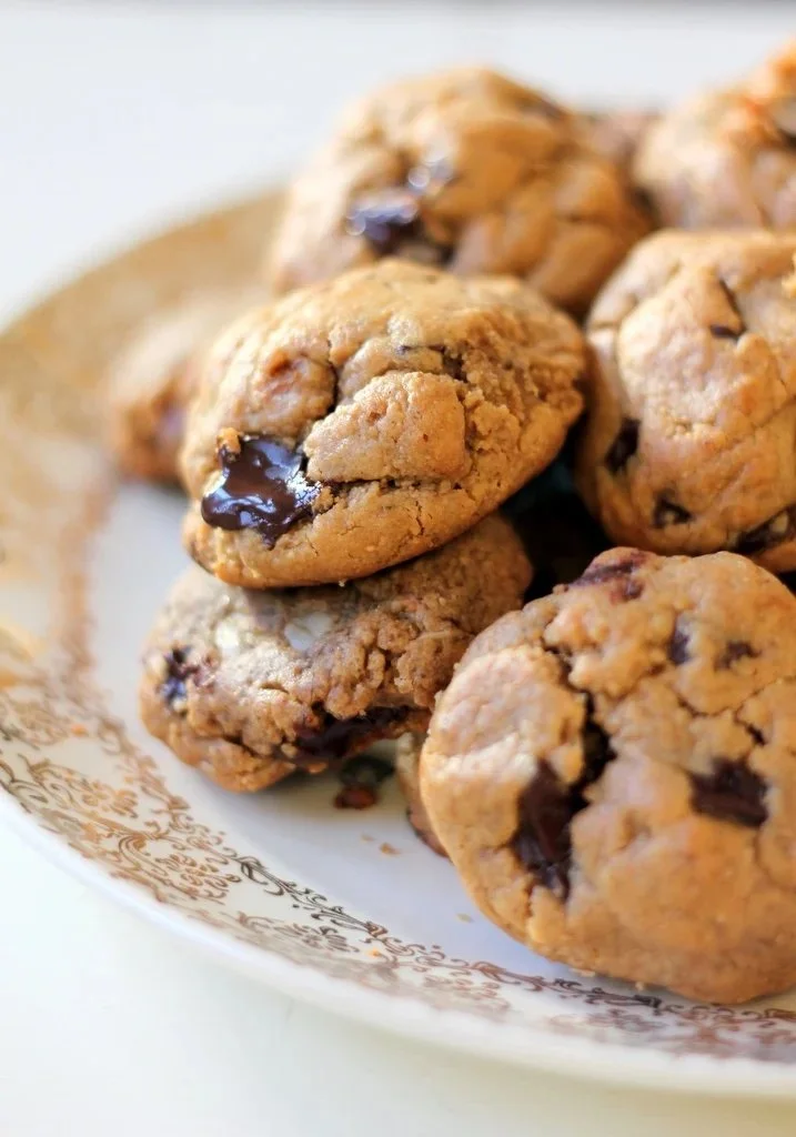 Flourless peanut butter chocolate chunk cookies on a plate