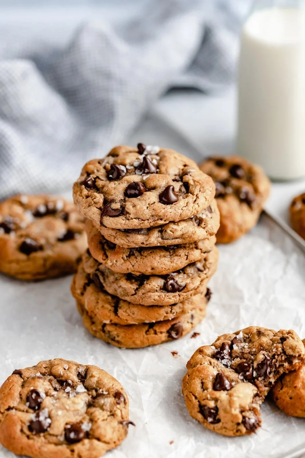 Flourless peanut butter oatmeal chocolate chip cookies on a cooling rack