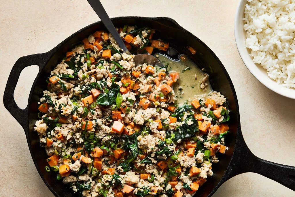 Delicious Coconut Chicken served with roasted Sweet Potato on a plate