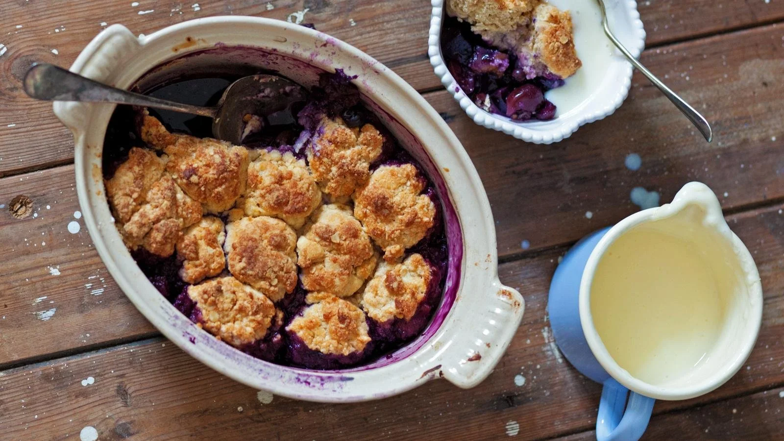Delicious homemade fruit cobbler topped with a golden crust and fresh fruit.