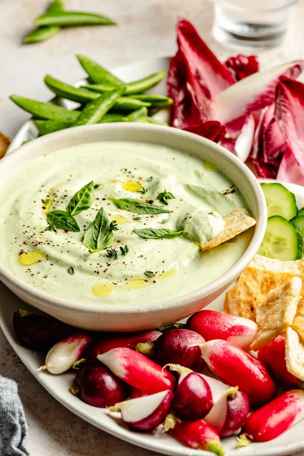 Garlic and Herb Whipped Cottage Cheese Dip served in a bowl