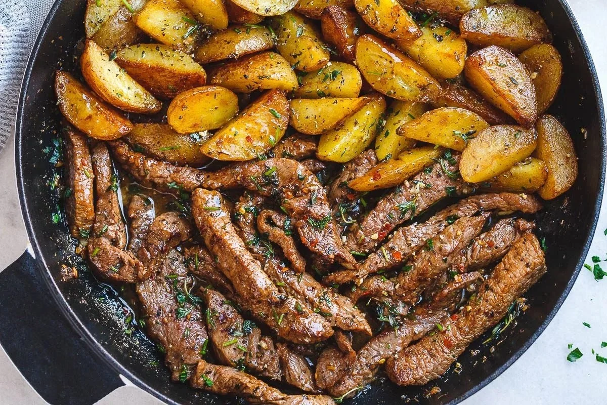 Delicious Garlic Butter Steak and Potatoes Skillet recipe with rich flavors.