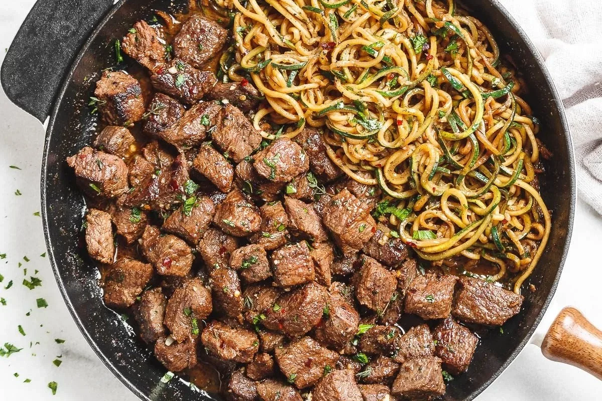 Garlic Butter Steak Bites served with Lemon Zucchini Noodles