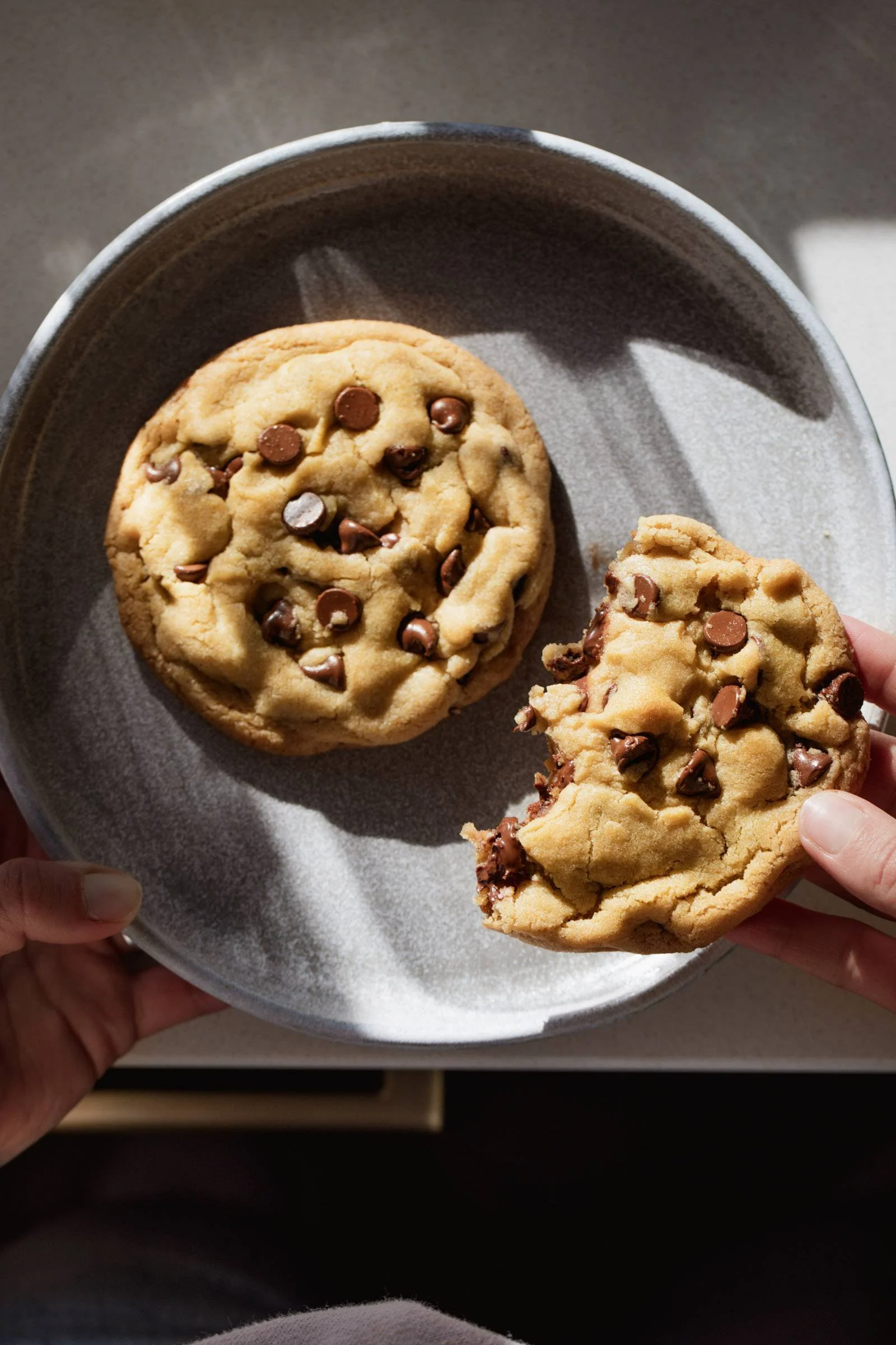 Giant gooey chocolate chip cookies fresh out of the oven