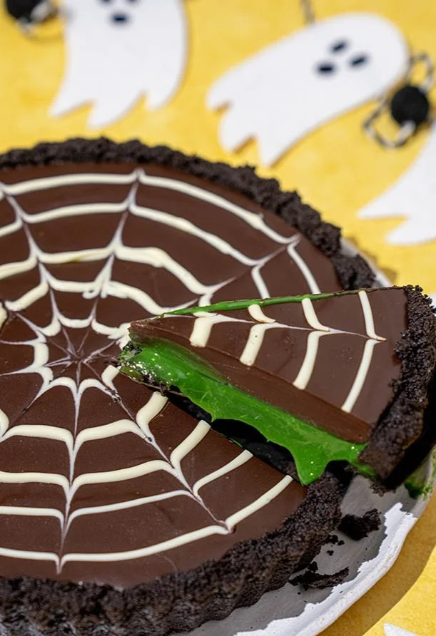 Gluten-free Halloween Slime Tart with vibrant colors and festive decorations
