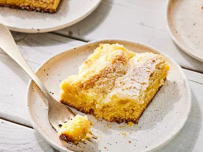 Delicious slice of Gooey Butter Cake on a plate