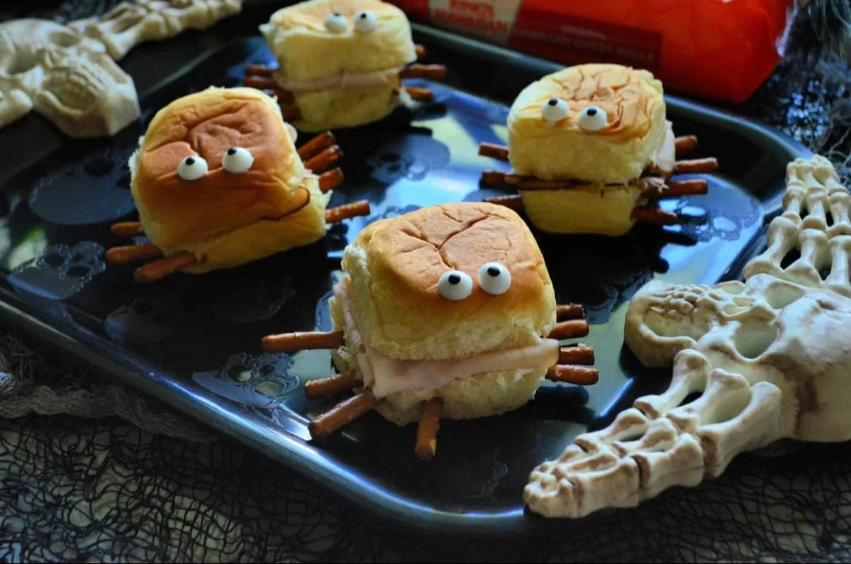 Halloween themed turkey and cream cheese spider sandwiches for kids.