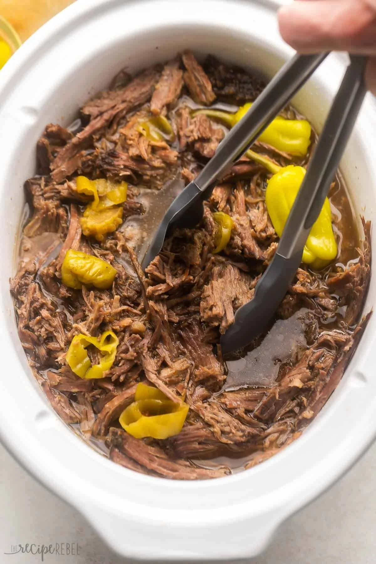 Delicious Italian Beef sandwich with tender meat and spices served on a crusty roll