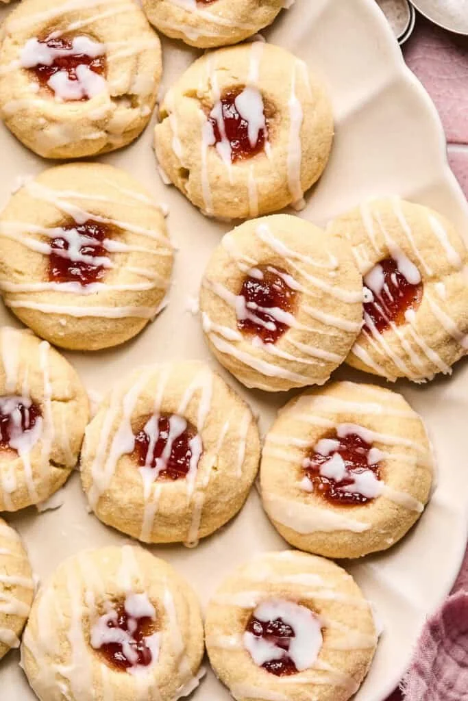 Freshly baked Jelly Thumbprint Cookies with colorful jam filling