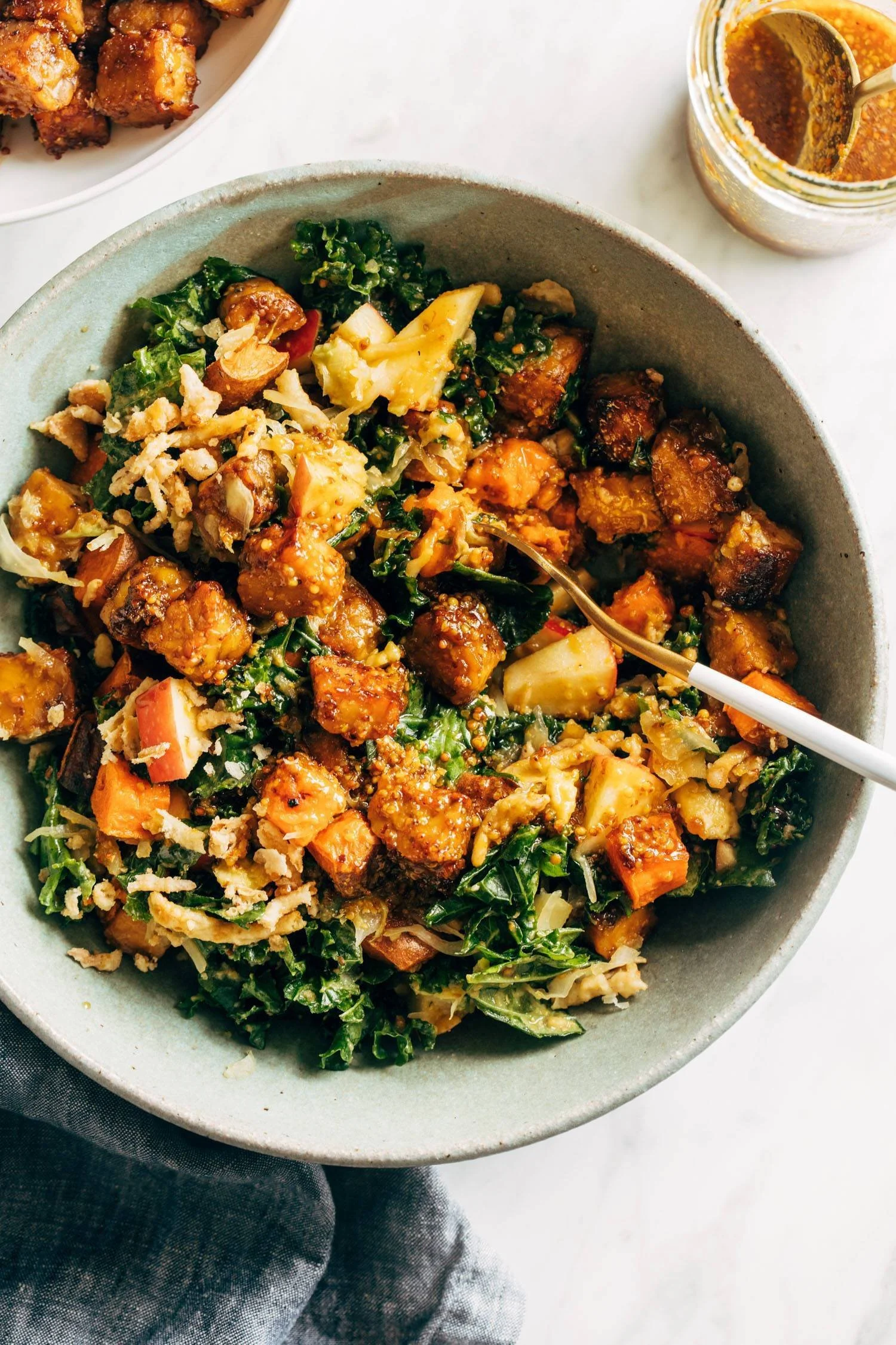 Plated Maple-Mustard Tempeh Bowls with fresh vegetables and grains