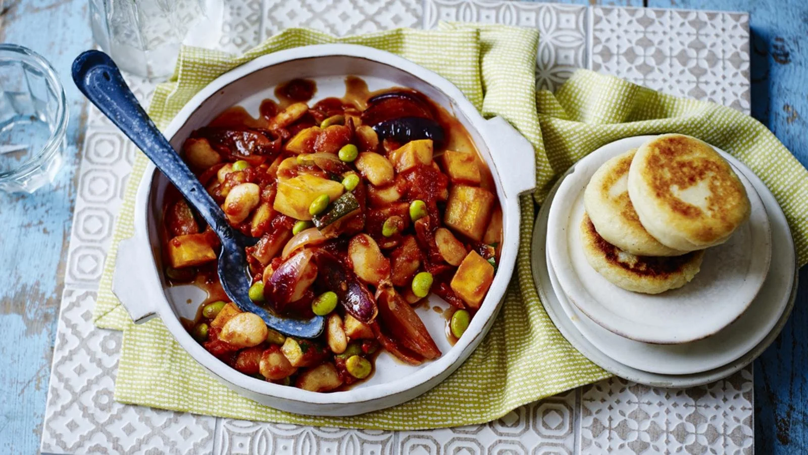 Delicious Mediterranean Bean Stew served with crispy potato griddle cakes.