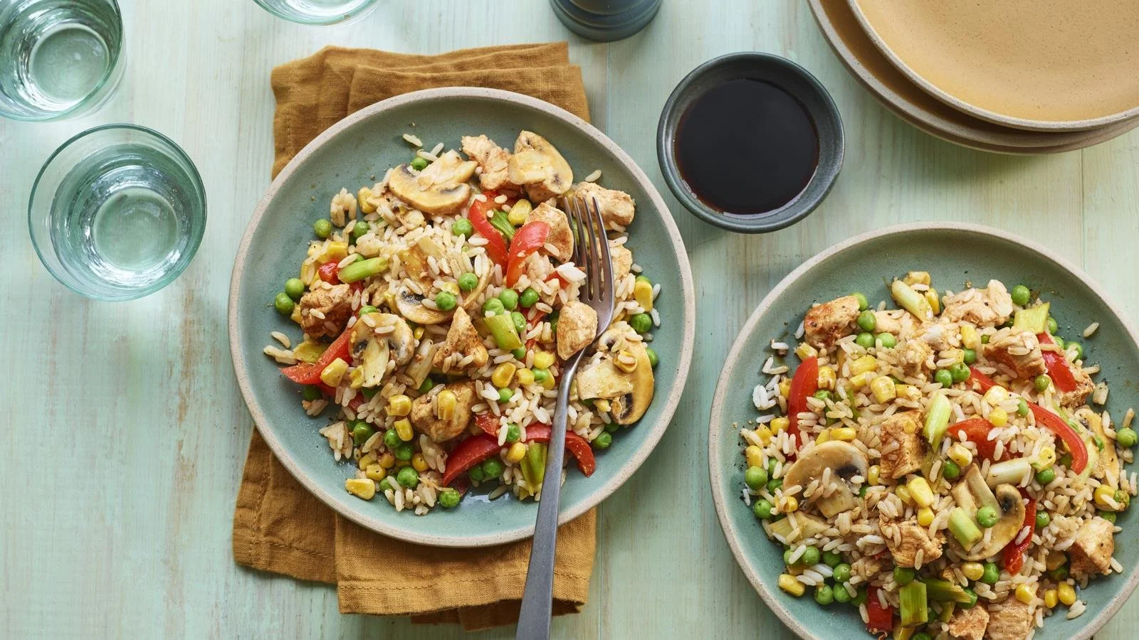 Microwave Chinese Style Chicken and Rice dish served in a bowl with vegetables