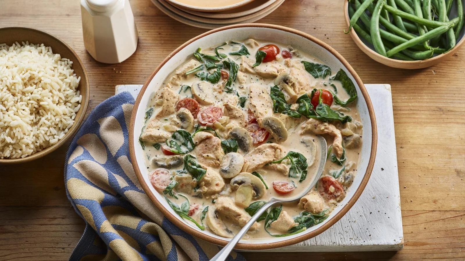 Delicious Microwave Tuscan Chicken served with fresh herbs and tomatoes