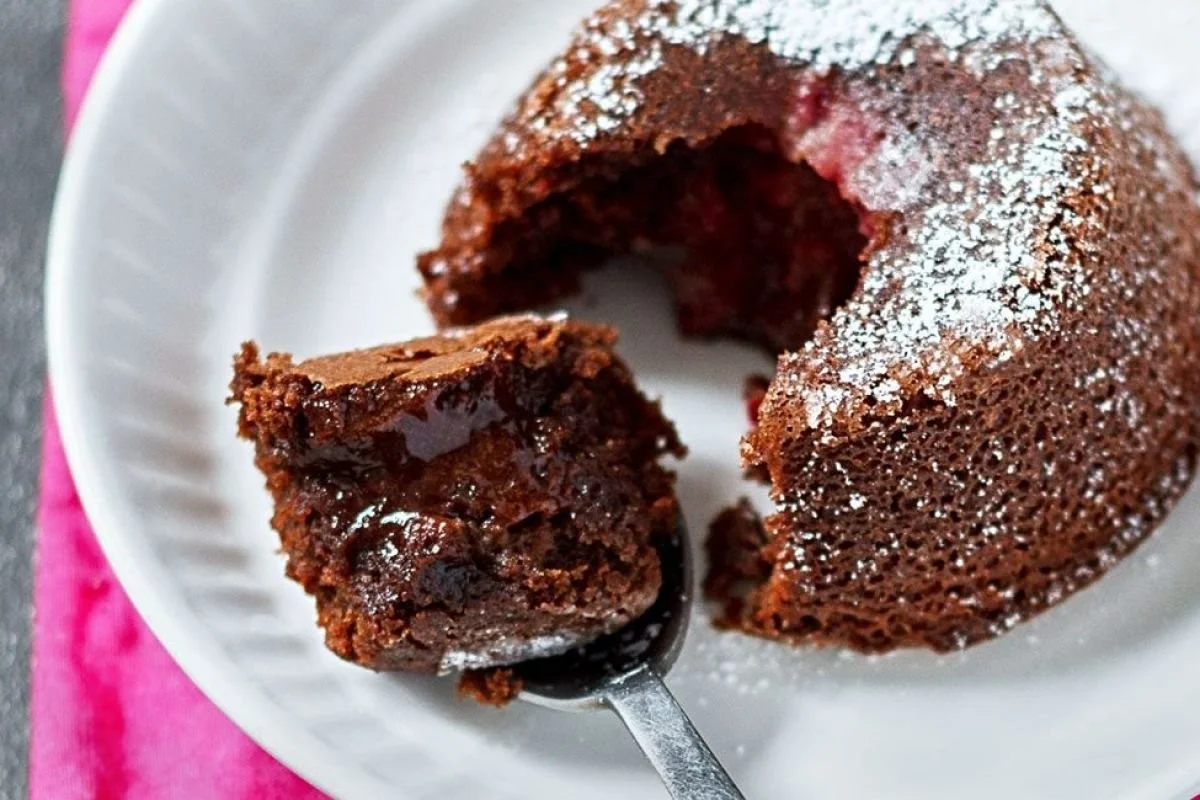 Delicious Mini Chocolate Raspberry Fondants topped with fresh raspberries