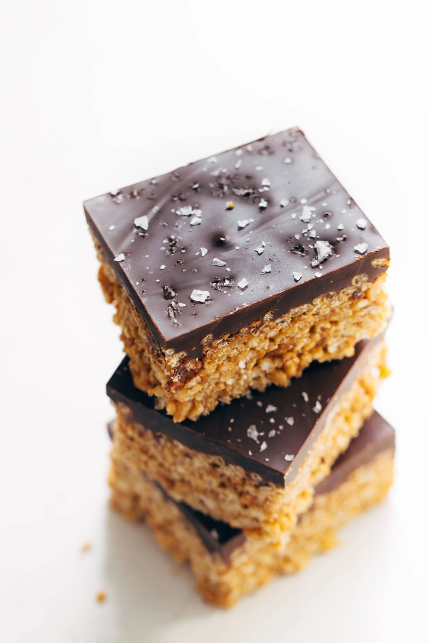 Delicious modern Scotcheroo Bars topped with chocolate and peanut butter.