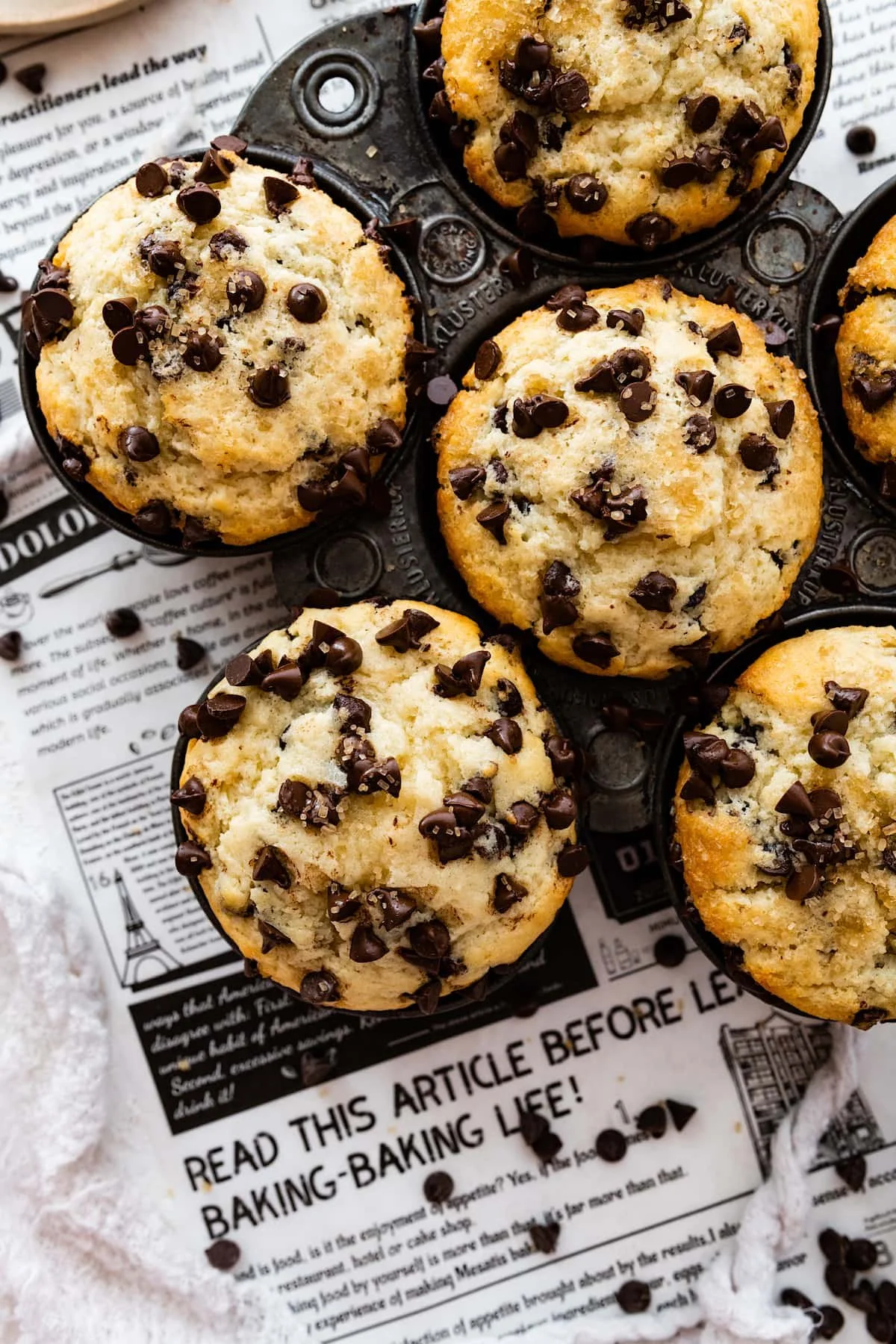 Delicious homemade muffins fresh from the oven with blueberries and chocolate chips.
