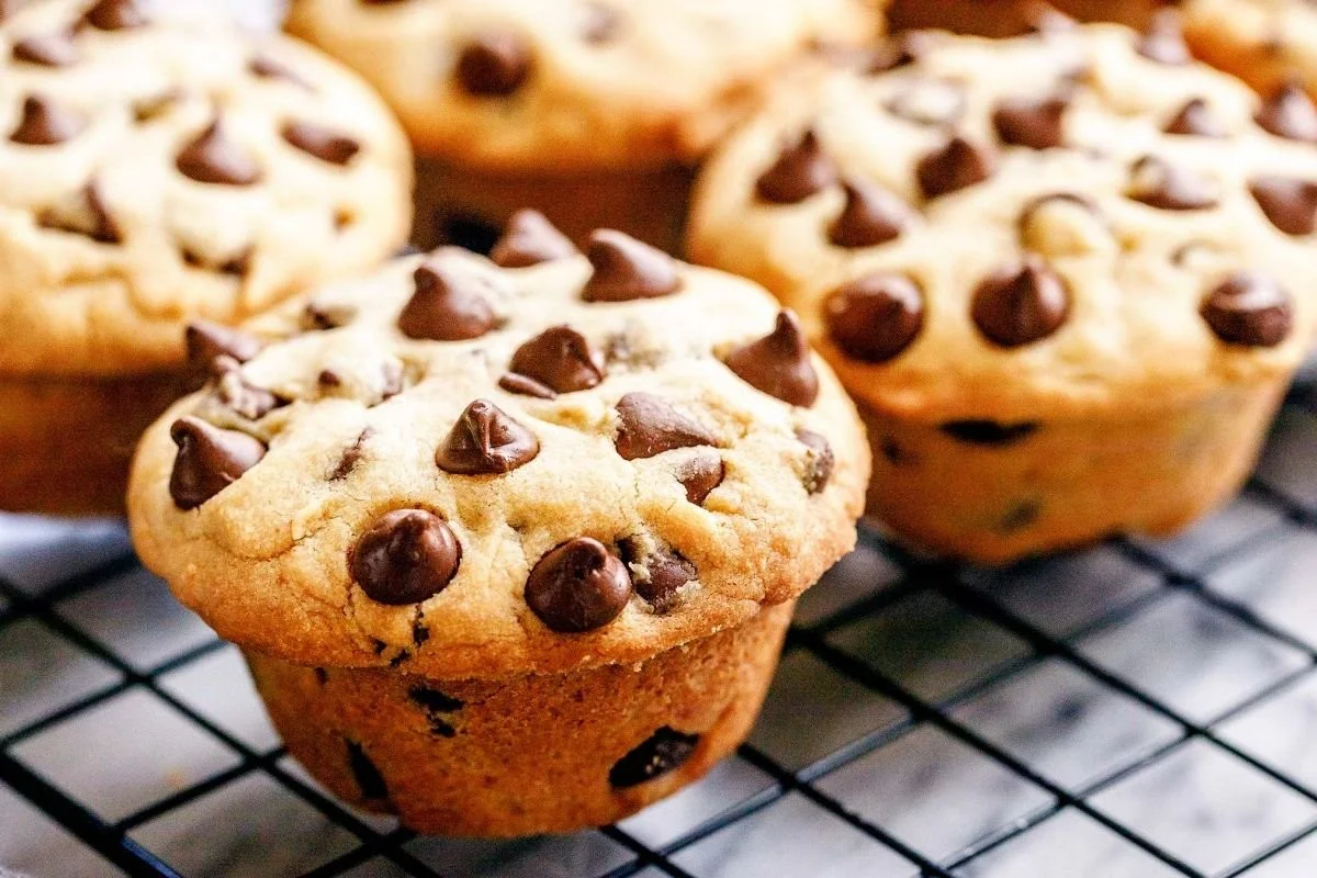 Decadent Nutella Cookie Cups topped with creamy Nutella and chocolate chips
