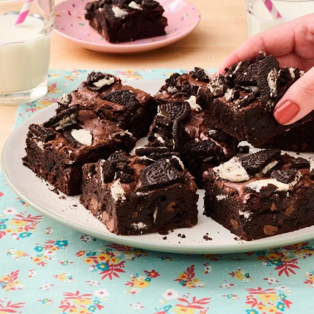 Delicious homemade Oreo brownies topped with crushed chocolate cookies.