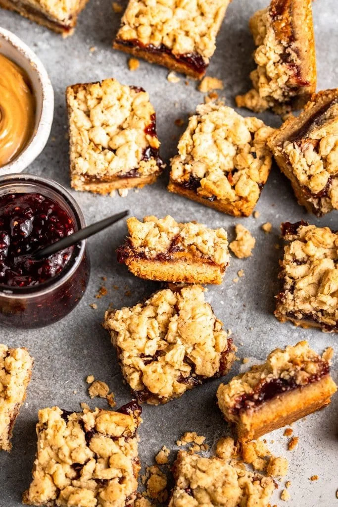 Delicious PB&J shortbread bars topped with peanut butter and jelly