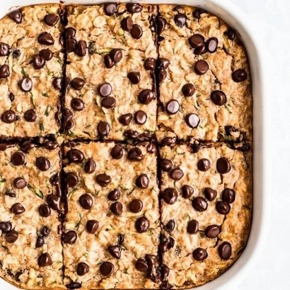 Peanut Butter Chocolate Chip Zucchini Baked Oatmeal in a vibrant dish