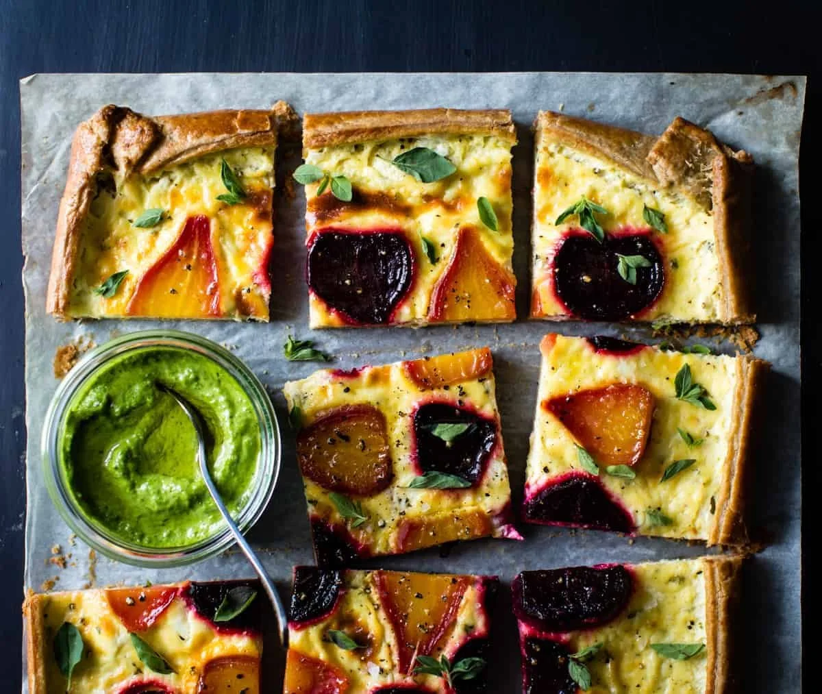 Ricotta Beet Galette served in a gluten-free crust, garnished with herbs