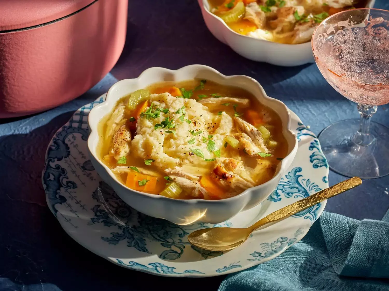 Bowl of Rustic Chicken and Dumplings with herbs and spices