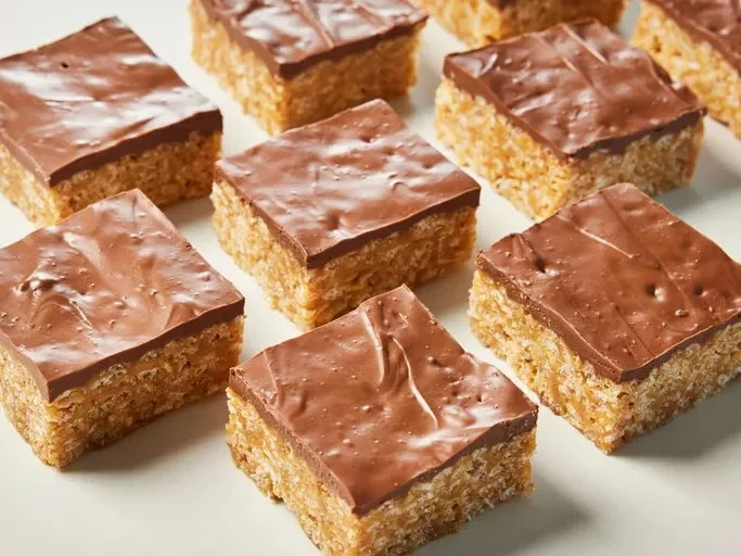 Homemade Scotcharoos with chocolate and butterscotch layers on a plate
