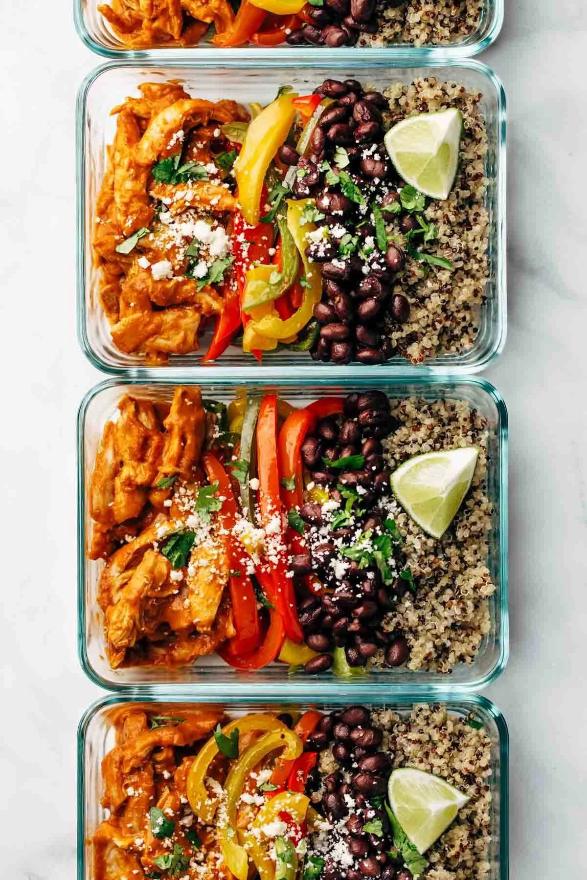 Delicious Sheet Pan Chicken Tinga Bowls with vibrant toppings and spices.