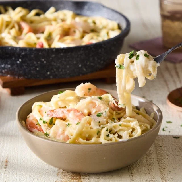 Delicious Shrimp Alfredo pasta dish with creamy sauce and succulent shrimp