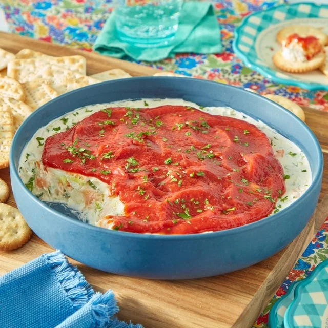 Delicious creamy shrimp dip served in a bowl with chips on the side