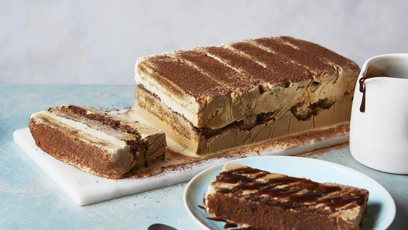 Delicious tiramisu ice cream cake featuring layers of coffee and creamy ice cream