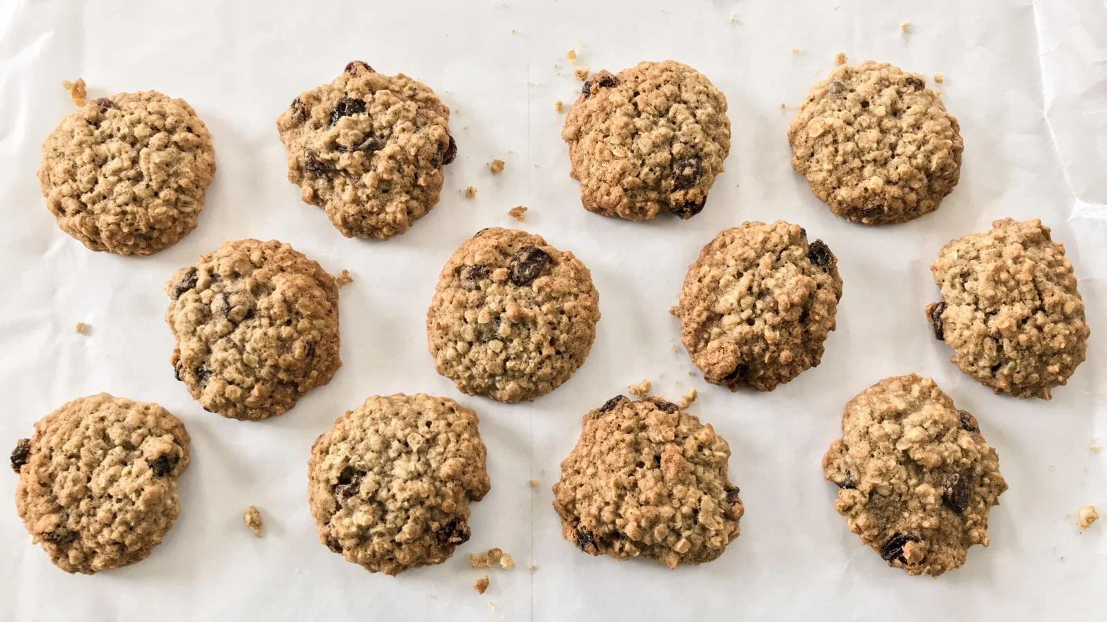 Vegan oatmeal raisin cookies stacked on a plate