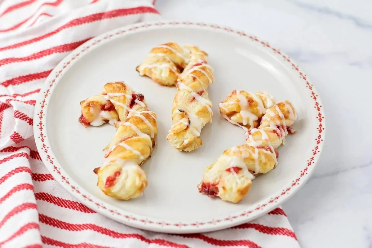 Delicious puff pastry candy canes perfect for holiday celebrations.